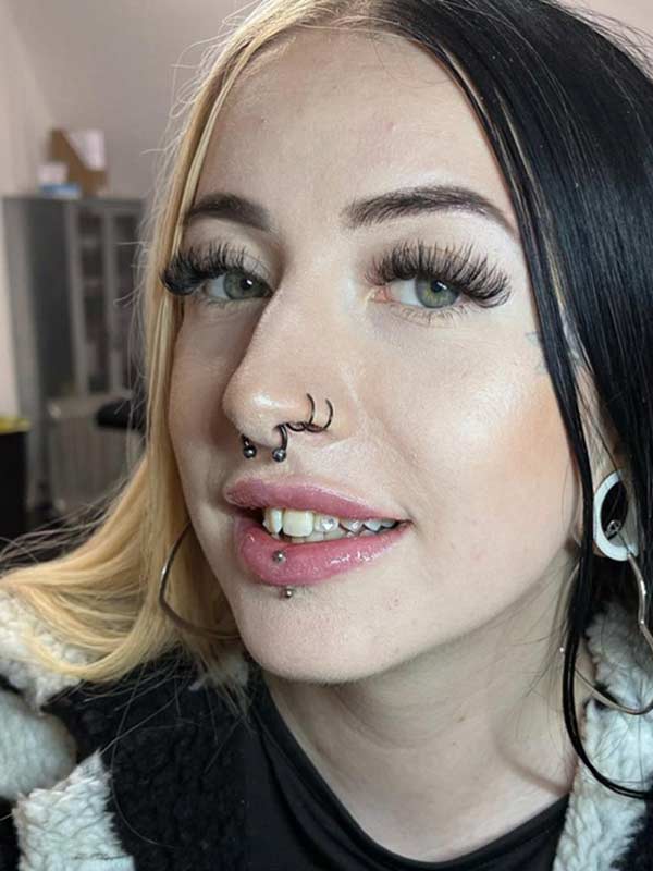 A client with Charmed Smile tooth gems
